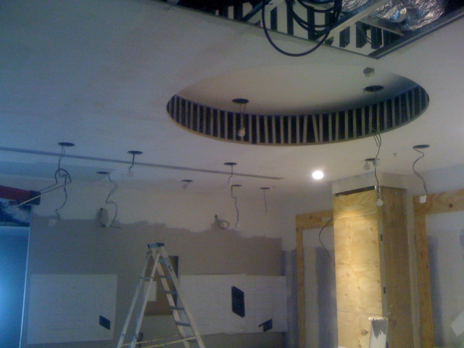 MF drum ceiling with slatted metallic perimeter during fit-out at Thomas Sabo, Milton Keynes