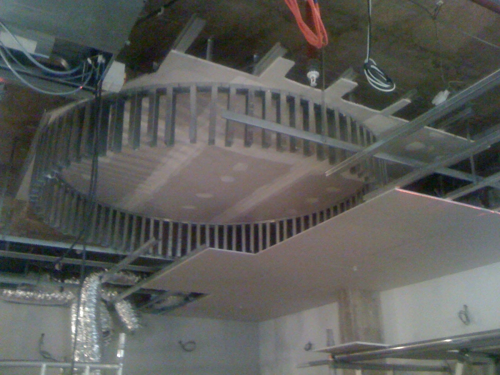 Curved slatted MF feature ceiling framework being built at Thomas Sabo, Milton Keynes